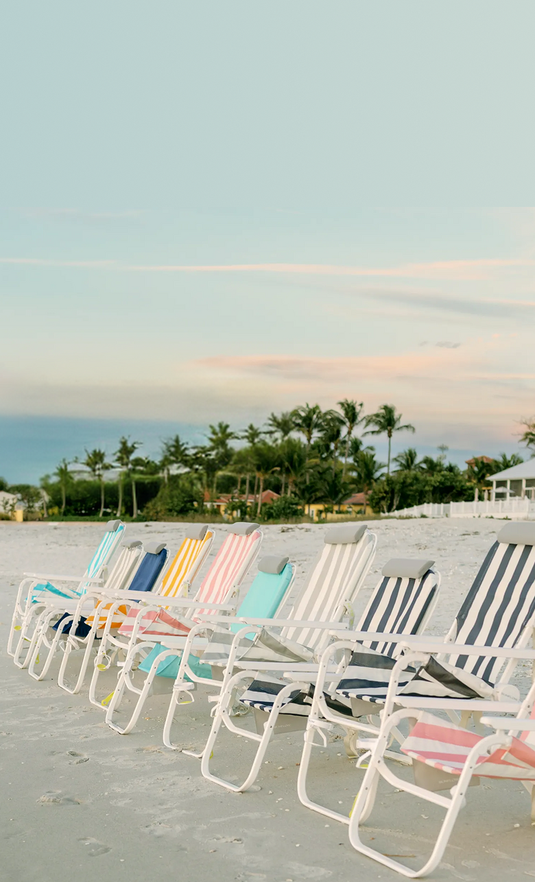 line up of colorful chairs
